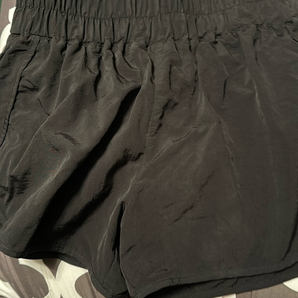 Women’s black XL high waisted crinkle type shorts.
